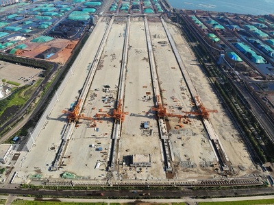 广西首个大型自动化散货装卸堆场通过交工验收